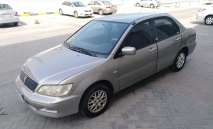 للبيع متسوبيشي Lancer 2002