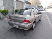 للبيع متسوبيشي Lancer 2002