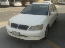 للبيع متسوبيشي Lancer 2002